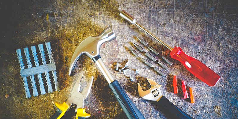 Tools on a cement floor.